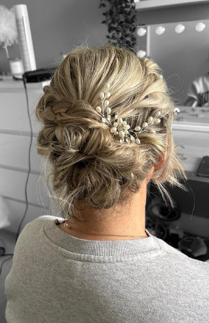 Bridal updo with pearl hair vine